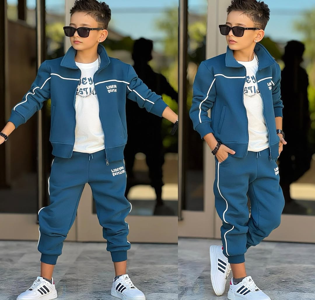 Two full-body views of a child wearing a blue tracksuit, white sneakers and sunglasses, standing in front of glass doors in bright daylight.